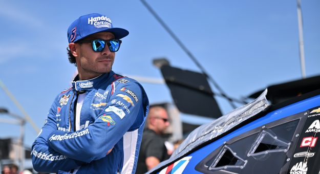 MADISON, ILLINOIS - SEPTEMBER 13: Kyle Larson, driver of the #5 HendrickCars.com Chevrolet, waits on the grid prior to the NASCAR Cup Series Enjoy Illinois 300 at WWT Raceway on September 13, 2026 in Madison, Illinois. (Photo by Amy Kontras/Getty Images) | Getty Images