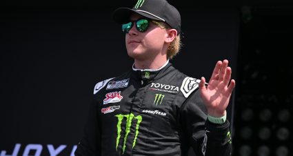 MADISON, ILLINOIS - SEPTEMBER 13: Ty Gibbs, driver of the #54 Monster Energy Toyota, waves to fans as he walks onstage during driver intros prior to the NASCAR Cup Series Enjoy Illinois 300 at WWT Raceway on September 13, 2026 in Madison, Illinois. (Photo by Amy Kontras/Getty Images) | Getty Images