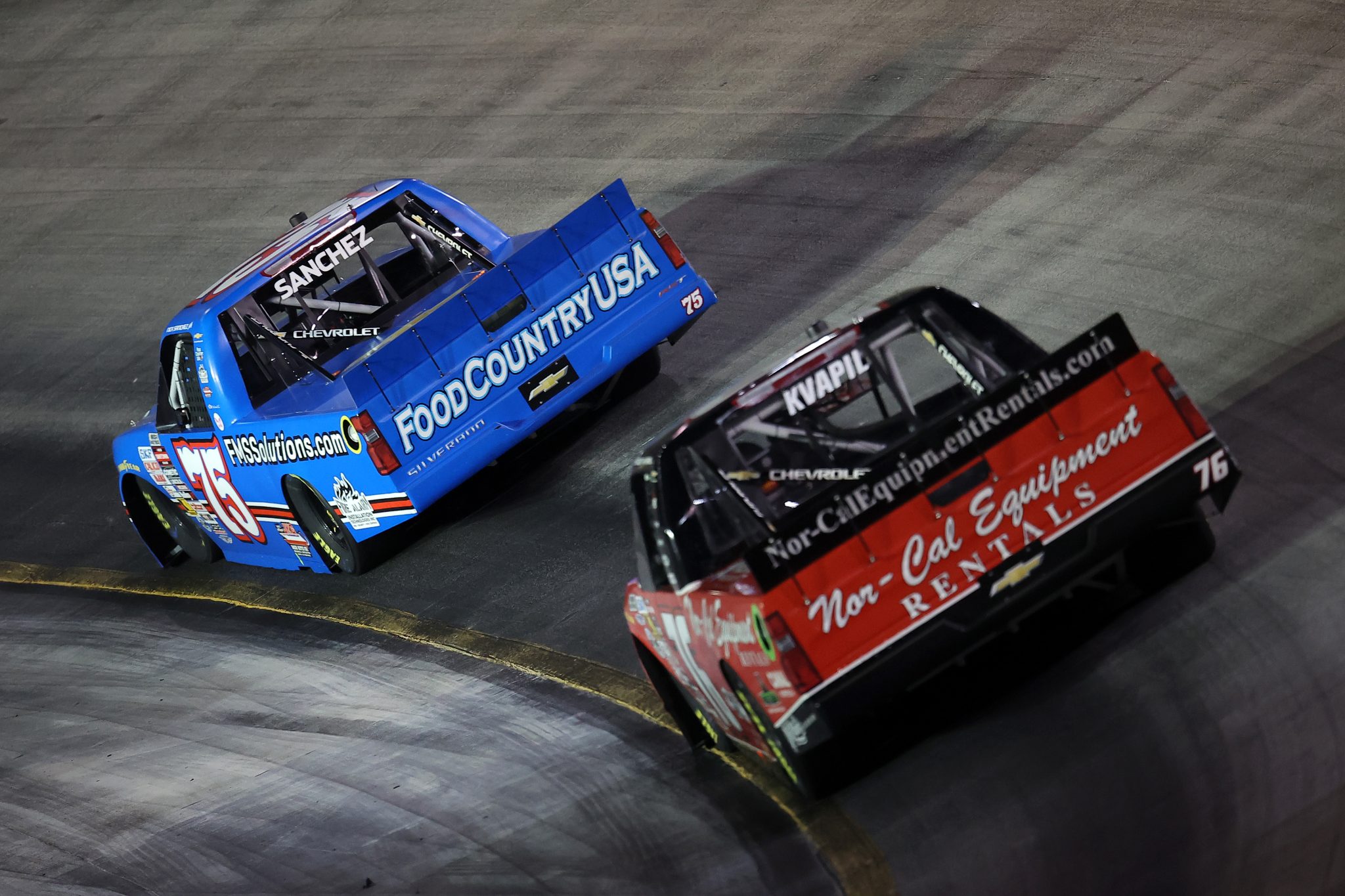 BRISTOL, TENNESSEE - SEPTEMBER 17: Nick Sanchez, driver of the #75 FMS Solutions Chevrolet, and Caden Kvapil, driver of the #76 Nor-Cal Equipment Rentals Chevrolet, race during the NASCAR Craftsman Truck Series UNOH 250 Presented by Ohio Logistics at Bristol Motor Speedway on September 17, 2026 in Bristol, Tennessee. (Photo by Jonathan Bachman/Getty Images) | Getty Images