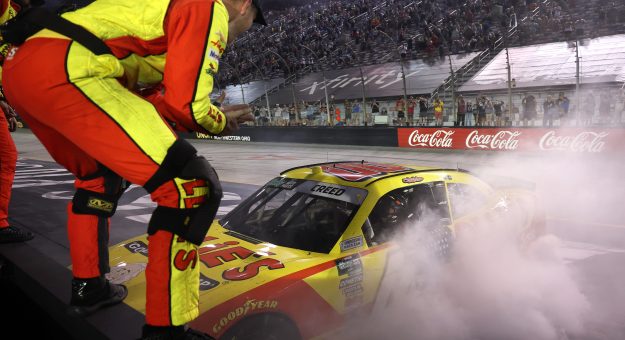 BRISTOL, TENNESSEE - SEPTEMBER 18: Sheldon Creed, driver of the #00 Ollie's Chevrolet, celebrates with a burnout after winning the NASCAR O'Reilly Auto Parts Series Food City 300 at Bristol Motor Speedway on September 18, 2026 in Bristol, Tennessee. (Photo by Chris Graythen/Getty Images) | Getty Images