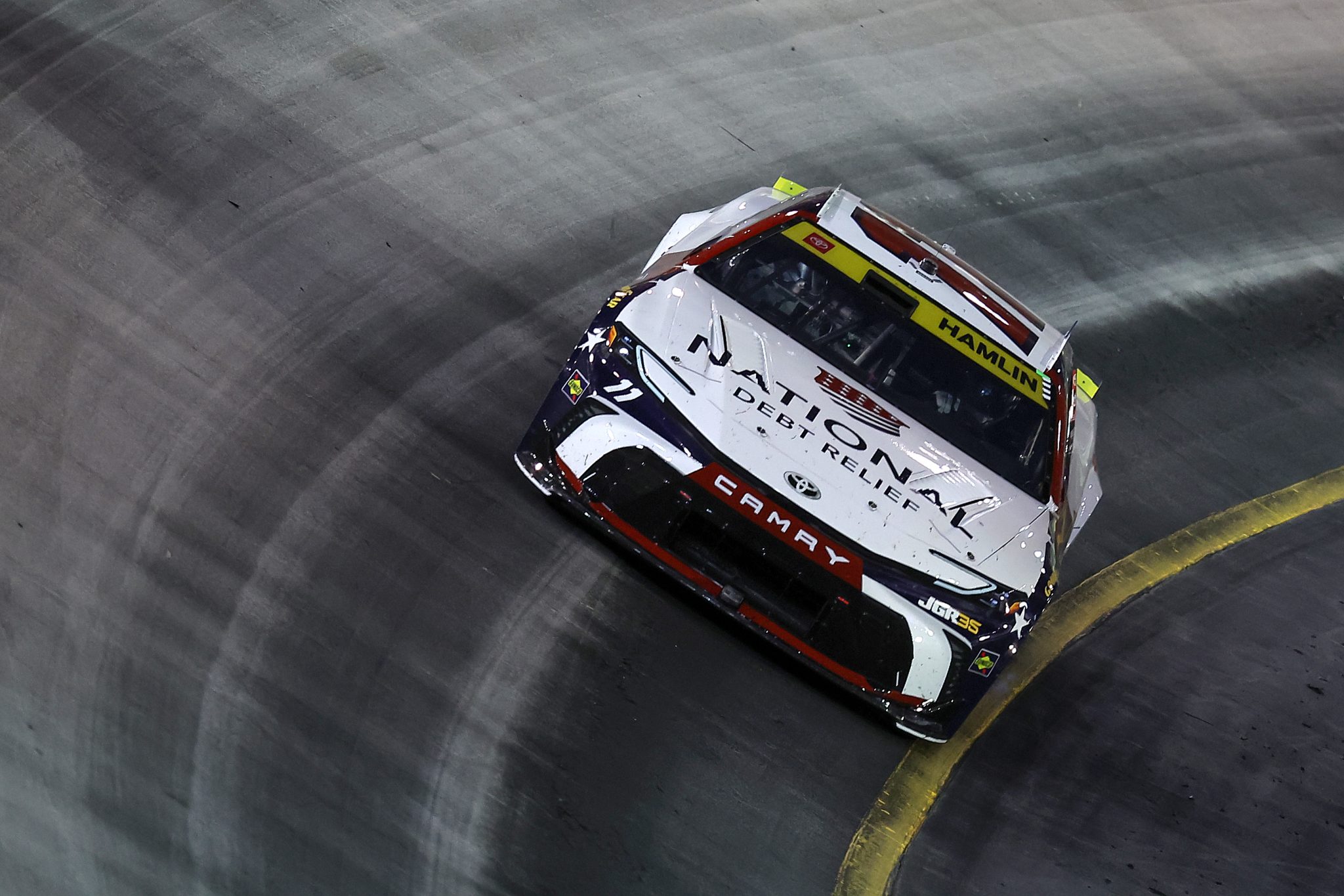 BRISTOL, TENNESSEE - SEPTEMBER 19: Denny Hamlin, driver of the #11 National Debt Relief Toyota, drives during the NASCAR Cup Series Bass Pro Shops Night Race at Bristol Motor Speedway on September 19, 2026 in Bristol, Tennessee. (Photo by Jonathan Bachman/Getty Images) | Getty Images
