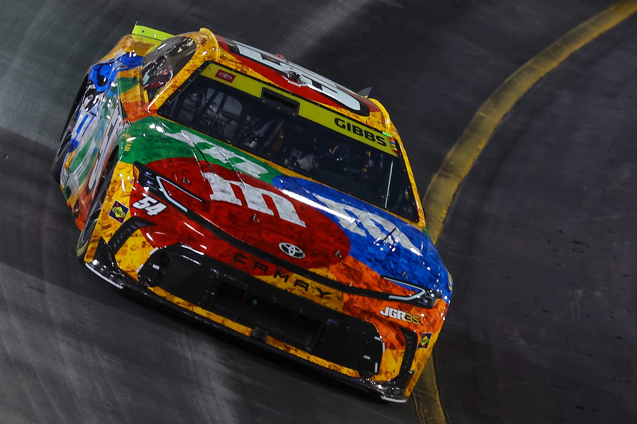 BRISTOL, TENNESSEE - SEPTEMBER 19: Ty Gibbs, driver of the #54 M&M's Kyle Busch Tribute Toyota, drives during the NASCAR Cup Series Bass Pro Shops Night Race at Bristol Motor Speedway on September 19, 2026 in Bristol, Tennessee. (Photo by Jonathan Bachman/Getty Images) | Getty Images