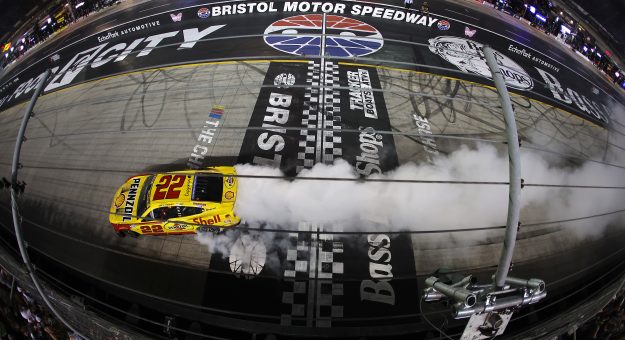 BRISTOL, TENNESSEE - SEPTEMBER 19: Joey Logano, driver of the #22 Shell Pennzoil Ford, celebrates with a burnout after winning the NASCAR Cup Series Bass Pro Shops Night Race at Bristol Motor Speedway on September 19, 2026 in Bristol, Tennessee. (Photo by Jonathan Bachman/Getty Images) | Getty Images