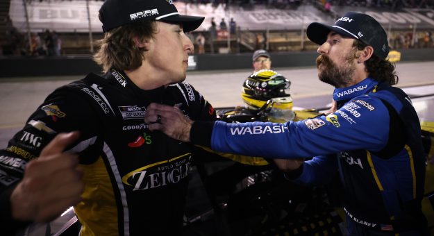 BRISTOL, TENNESSEE - SEPTEMBER 19: Carson Hocevar, driver of the #77 Zeigler Auto Group Chevrolet, (L) and Ryan Blaney, driver of the #12 WABASH Ford, get into an altercation after the NASCAR Cup Series Bass Pro Shops Night Race at Bristol Motor Speedway on September 19, 2026 in Bristol, Tennessee. (Photo by Chris Graythen/Getty Images) | Getty Images