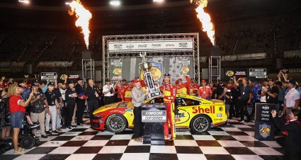 BRISTOL, TENNESSEE - SEPTEMBER 19: Johnny Morris, Founder, Bass Pro Shops presents the Bass Pro Shops Night Race trophy to Joey Logano, driver of the #22 Shell Pennzoil Ford, celebrates in victory lane after winning  the NASCAR Cup Series Bass Pro Shops Night Race at Bristol Motor Speedway on September 19, 2026 in Bristol, Tennessee. (Photo by Chris Graythen/Getty Images) | Getty Images