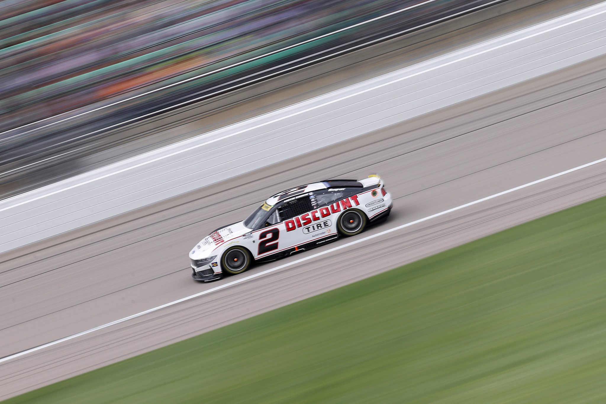 KANSAS CITY, KANSAS - SEPTEMBER 27: Austin Cindric, driver of the #2 Discount Tire Ford, drives during the NASCAR Cup Series Hollywood Casino 400 at Kansas Speedway on September 27, 2026 in Kansas City, Kansas. (Photo by Sean Gardner/Getty Images) | Getty Images