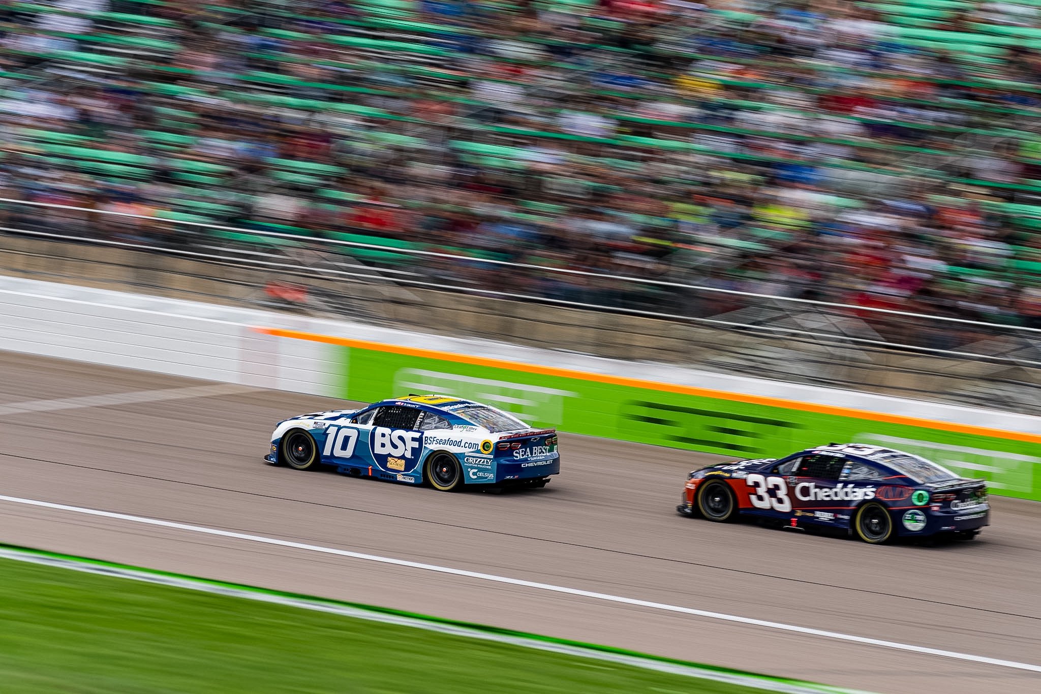 KANSAS CITY, KANSAS - SEPTEMBER 27: Ty Dillon, driver of the #10 Sea Best Chevrolet and Austin Hill, driver of the #33 Cheddar's Scratch Kitchen Chevrolet, drives during the NASCAR Cup Series Hollywood Casino 400 at Kansas Speedway on September 27, 2026 in Kansas City, Kansas. (Photo from Kaulig Racing)