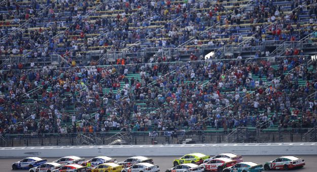 KANSAS CITY, KANSAS - SEPTEMBER 27: Kyle Larson, driver of the #5 HendrickCars.com Chevrolet, leads the field during the NASCAR Cup Series Hollywood Casino 400 at Kansas Speedway on September 27, 2026 in Kansas City, Kansas. (Photo by Sean Gardner/Getty Images) | Getty Images