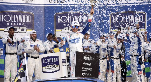 KANSAS CITY, KANSAS - SEPTEMBER 27: Kyle Larson, driver of the #5 HendrickCars.com Chevrolet, celebrates in victory lane after winning the NASCAR Cup Series Hollywood Casino 400 at Kansas Speedway on September 27, 2026 in Kansas City, Kansas. (Photo by Sean Gardner/Getty Images) | Getty Images
