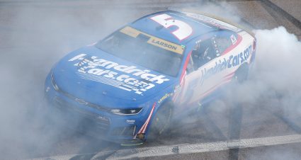 KANSAS CITY, KANSAS - SEPTEMBER 27: Kyle Larson, driver of the #5 HendrickCars.com Chevrolet, celebrates with a burnout after winning the NASCAR Cup Series Hollywood Casino 400 at Kansas Speedway on September 27, 2026 in Kansas City, Kansas. (Photo by Jonathan Bachman/Getty Images) | Getty Images
