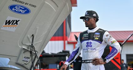 MADISON, ILLINOIS - SEPTEMBER 12: Lavar Scott, driver of the #45 Strictly Friendly Ford, looks on during qualifying for the NASCAR O'Reilly Auto Parts Series Nu Way 225 Powered by Bobcat and Sauced by Blues Hog at WWT Raceway on September 12, 2026 in Madison, Illinois. (Photo by Amy Kontras/Getty Images) | Getty Images