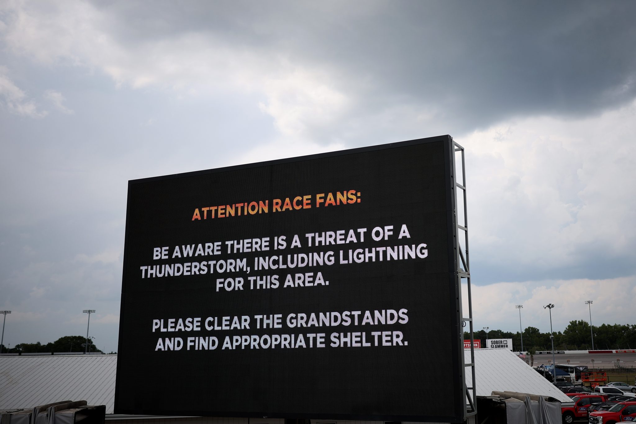 DARLINGTON, SOUTH CAROLINA - SEPTEMBER 05:  A digital sign displays a thunderstorm warning during practice for the NASCAR Cup Series Cook Out Southern 500 at Darlington Raceway on September 05, 2026 in Darlington, South Carolina. (Photo by James Gilbert/Getty Images) | Getty Images