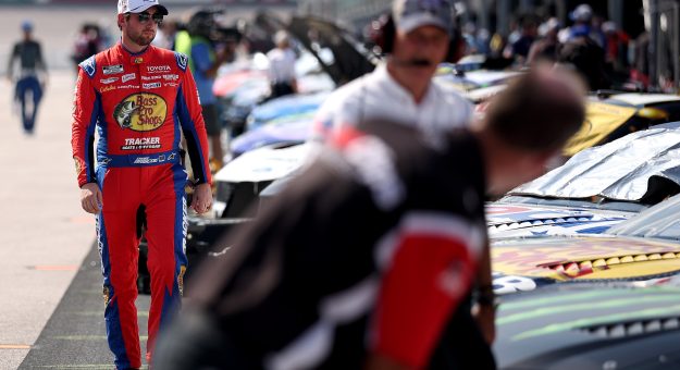 DARLINGTON, SOUTH CAROLINA - SEPTEMBER 05: Chase Briscoe, driver of the #19 Bass Pro Shops Toyota, walks the grid during practice for the NASCAR Cup Series Cook Out Southern 500 at Darlington Raceway on September 05, 2026 in Darlington, South Carolina. (Photo by James Gilbert/Getty Images) | Getty Images