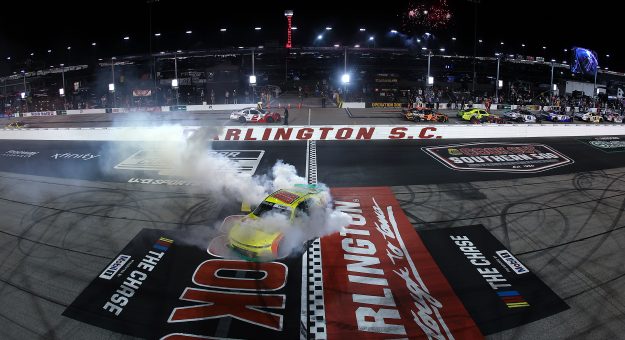DARLINGTON, SOUTH CAROLINA - SEPTEMBER 05: Sheldon Creed, driver of the #00 Ollie's Chevrolet, celebrates with a burnout as fireworks erupt after winning the NASCAR O'Reilly Auto Parts Series Fleetio 200 at Darlington Raceway on September 05, 2026 in Darlington, South Carolina. (Photo by Meg Oliphant/Getty Images) | Getty Images