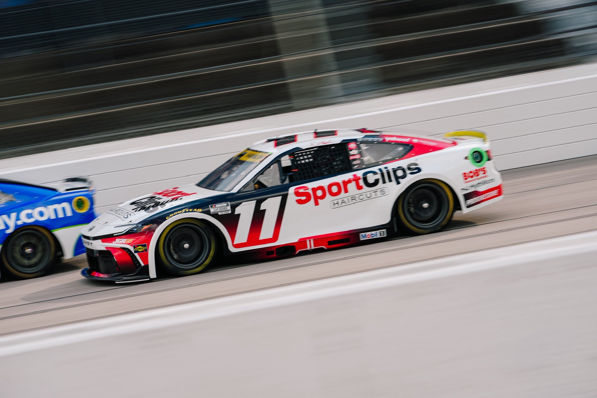 DARLINGTON, SOUTH CAROLINA - SEPTEMBER 06: Denny Hamlin, driver of the #11 Sport Clips Haircuts Toyota drives during the NASCAR Cup Series Cook Out Southern 500 at Darlington Raceway on September 06, 2026 in Darlington, South Carolina. (Photo from Joe Gibbs Racing)