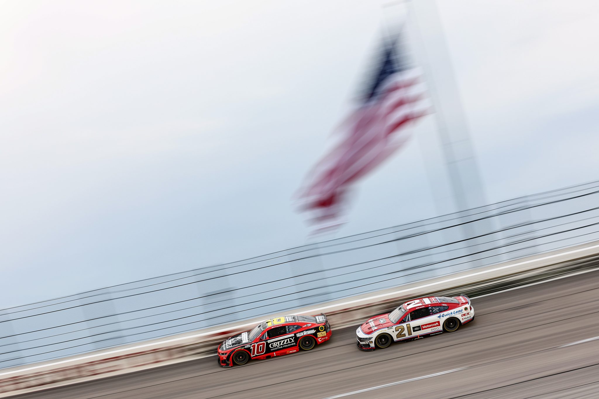 DARLINGTON, SOUTH CAROLINA - SEPTEMBER 06: Ty Dillon, driver of the #10 Grizzly Nicotine Pouches Chevrolet, and Josh Berry, driver of the #21 Motorcraft/Quick Lane Ford, race during the NASCAR Cup Series Cook Out Southern 500 at Darlington Raceway on September 06, 2026 in Darlington, South Carolina. (Photo by Meg Oliphant/Getty Images) | Getty Images