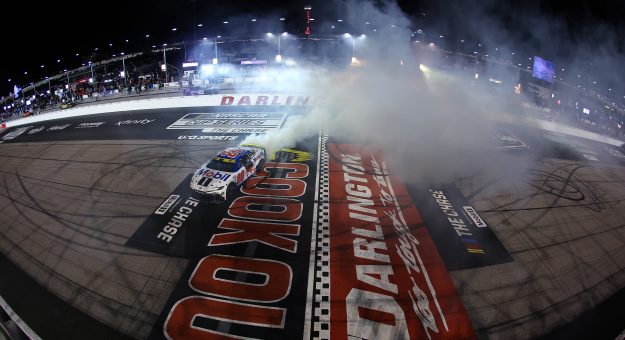 DARLINGTON, SOUTH CAROLINA - SEPTEMBER 06: Christopher Bell, driver of the #20 Mobil 1 Toyota, celebrates with a burnout after winning the NASCAR Cup Series Cook Out Southern 500 at Darlington Raceway on September 06, 2026 in Darlington, South Carolina. (Photo by James Gilbert/Getty Images) | Getty Images